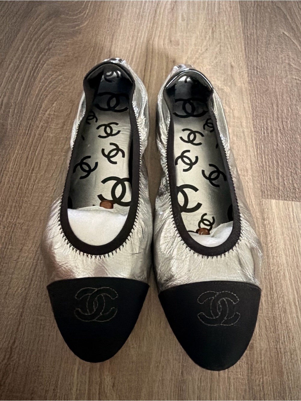 CHANEL Silver Leather Ballet Flats with Black Cap-Toe